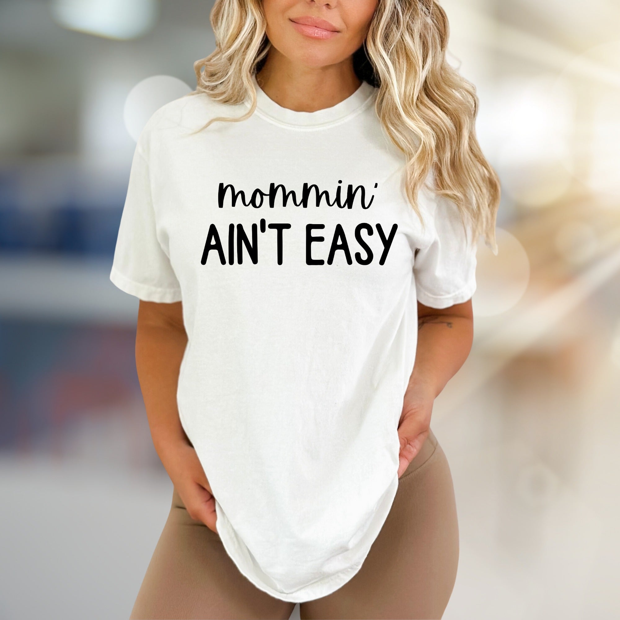 "Mommin' Ain't Easy" Humorous Graphic Tee, a Relatable Pick for Moms