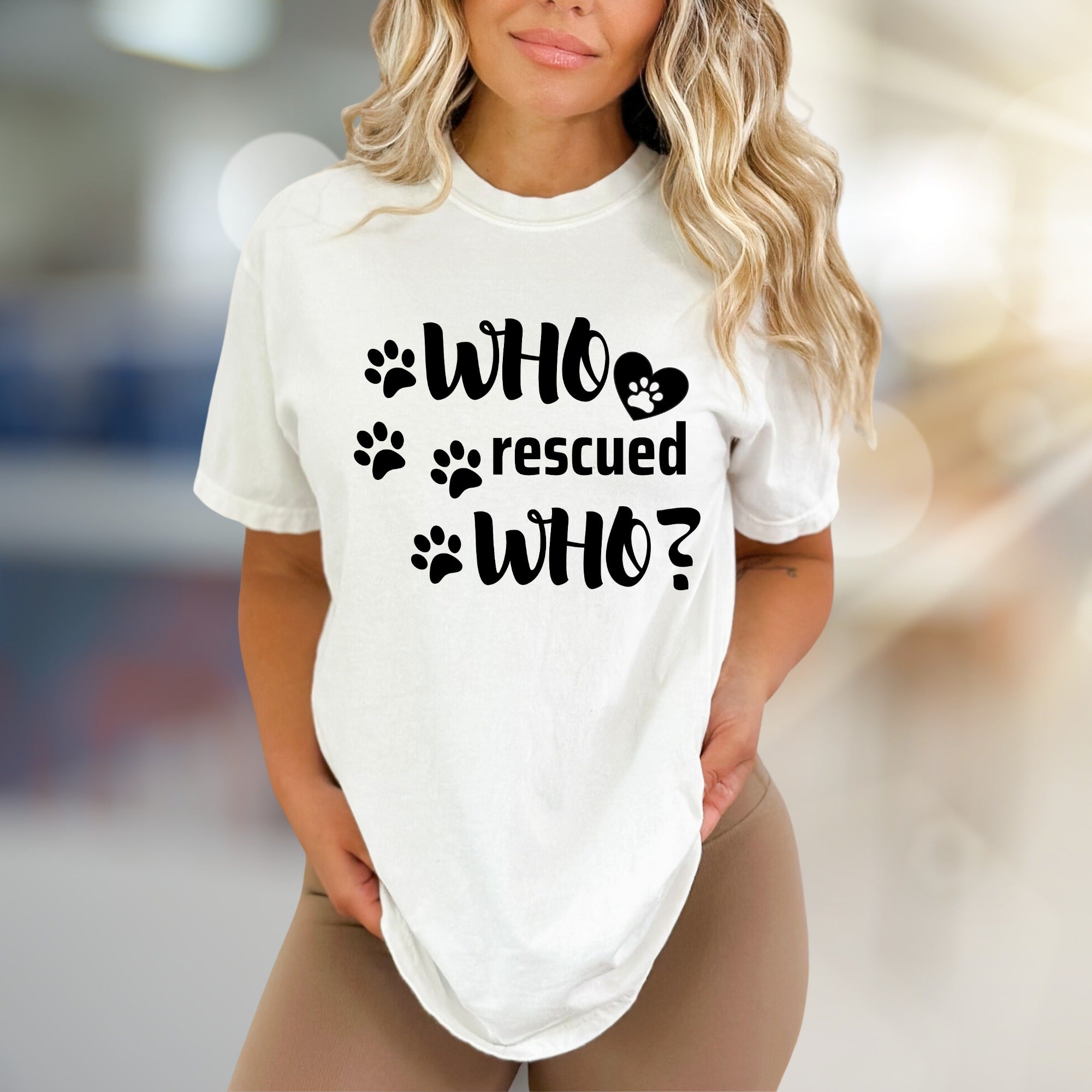 "WHO rescued WHO?" Paw Print Graphic Tee, a Heartfelt Pick for Pet Lovers