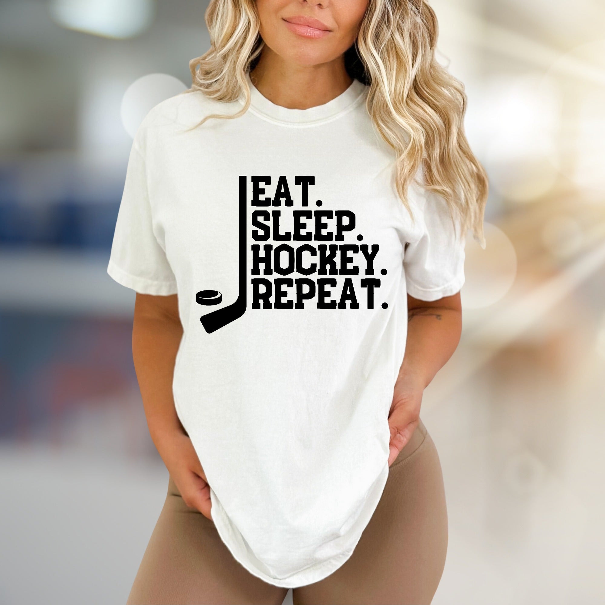 "EAT. SLEEP. HOCKEY. REPEAT." Hockey Lover Graphic Tee, a Lifestyle Pick for Sports Fans