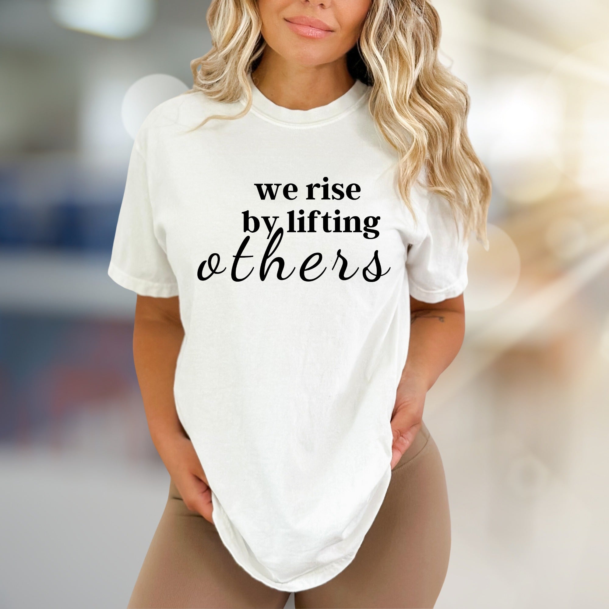 "We Rise by Lifting Others" Inspirational Graphic Tee, a Compassionate Pick for Everyday Wear
