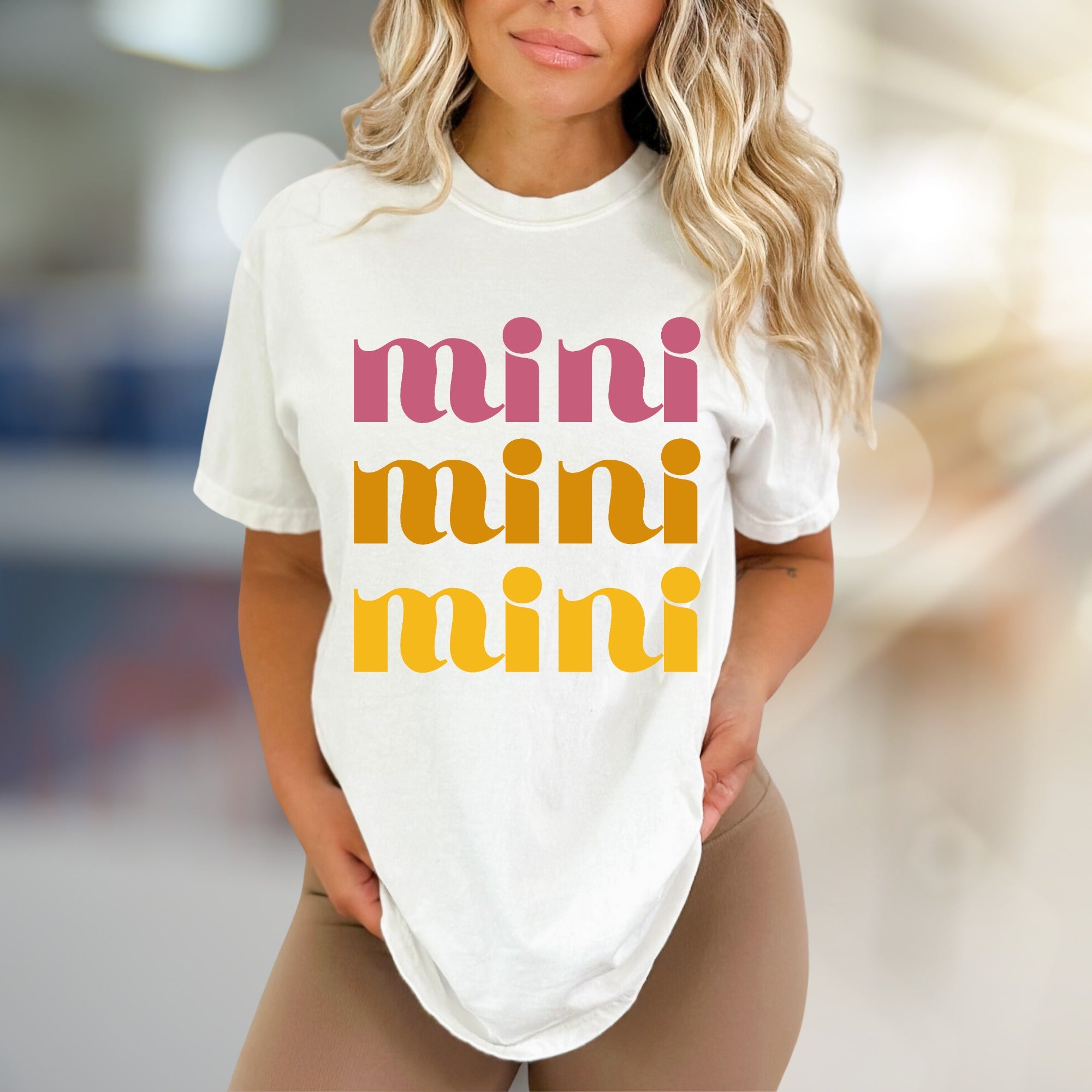 "mini mini mini" Retro Groovy Graphic Tee, a Playful Pick for Trendsetters