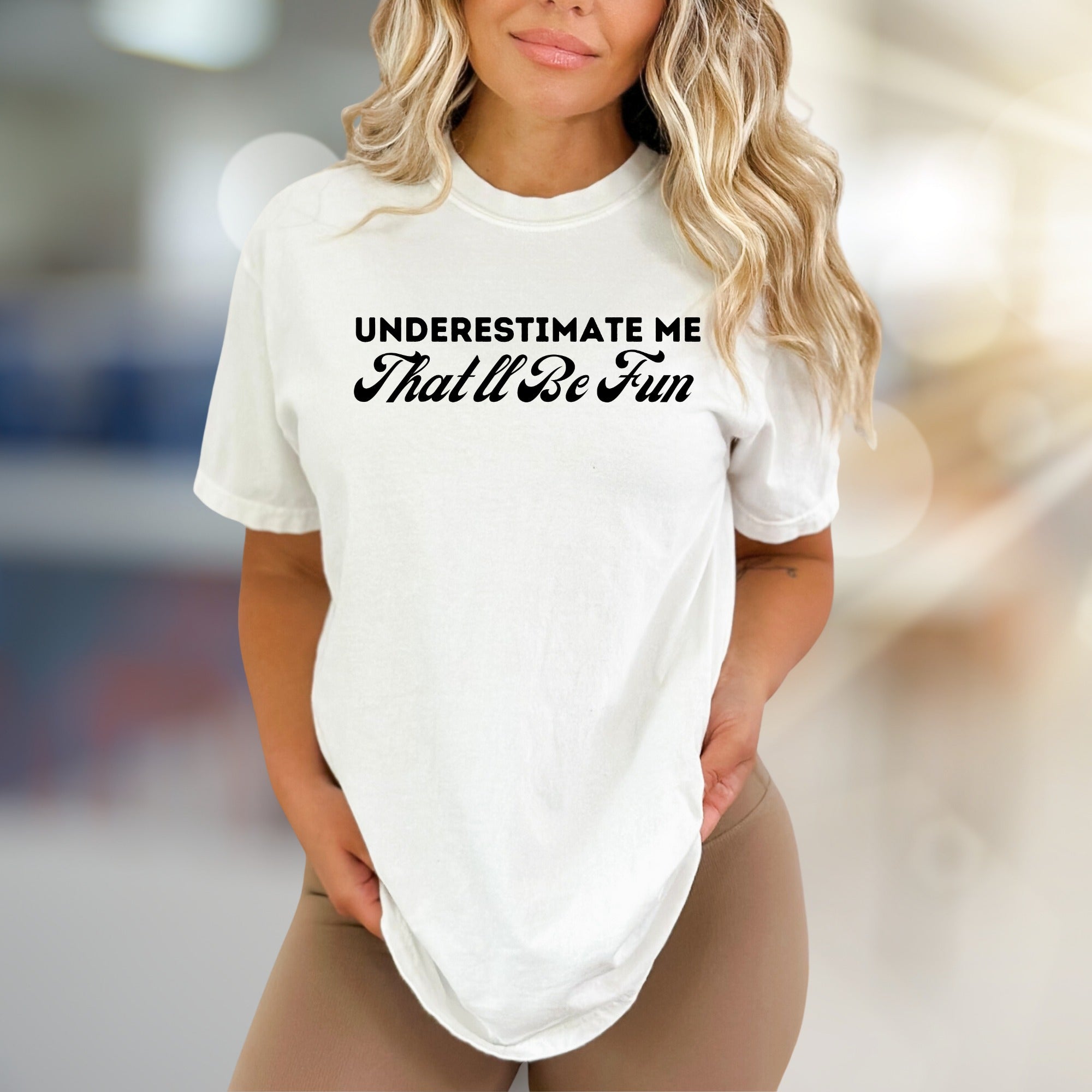 "UNDERESTIMATE ME That'll Be Fun" Sassy Statement Graphic Tee, a Bold Pick for Confident Individuals