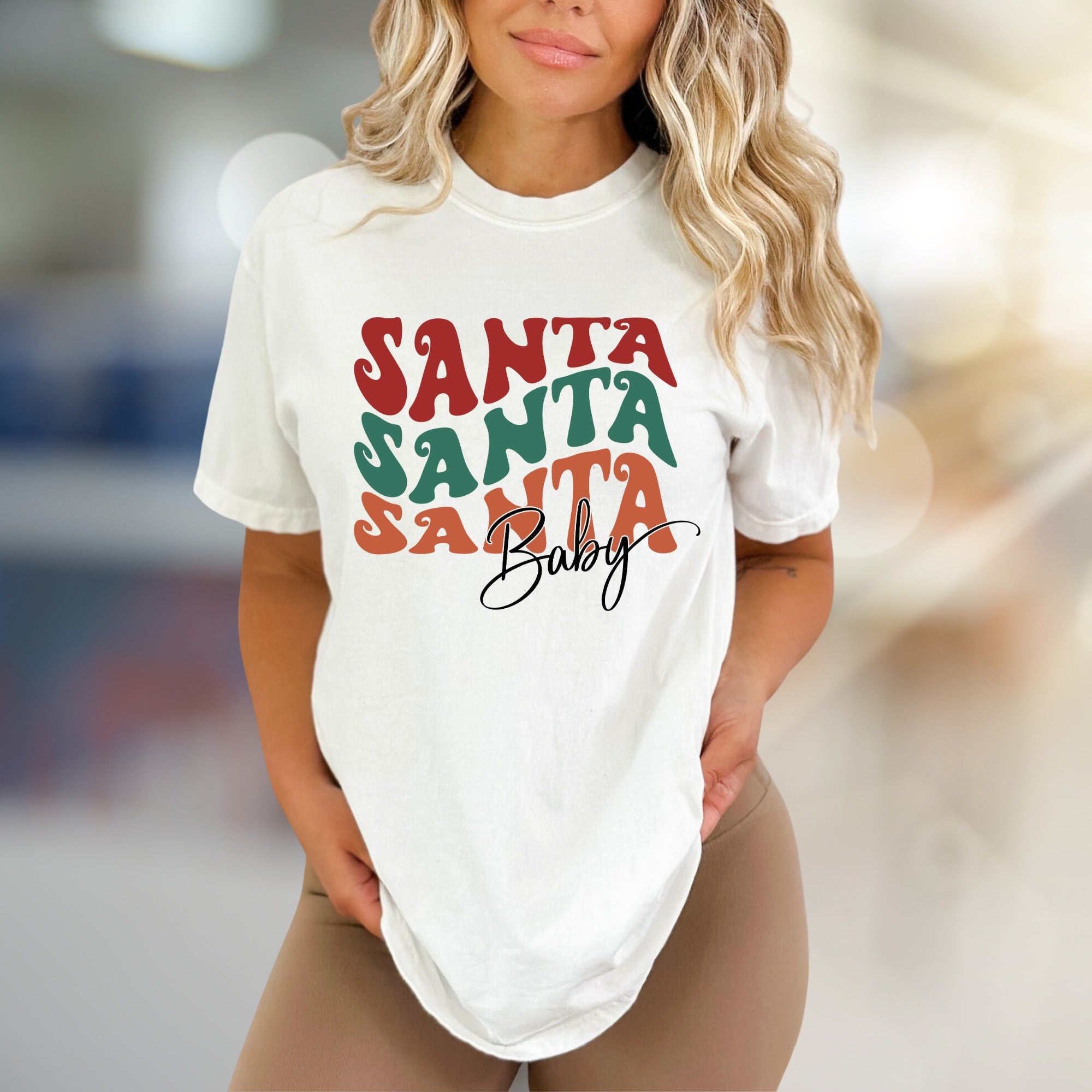 "SANTA SANTA SANTA Baby" Retro Christmas Graphic Tee, a Festive Niche for Holiday Enthusiasts