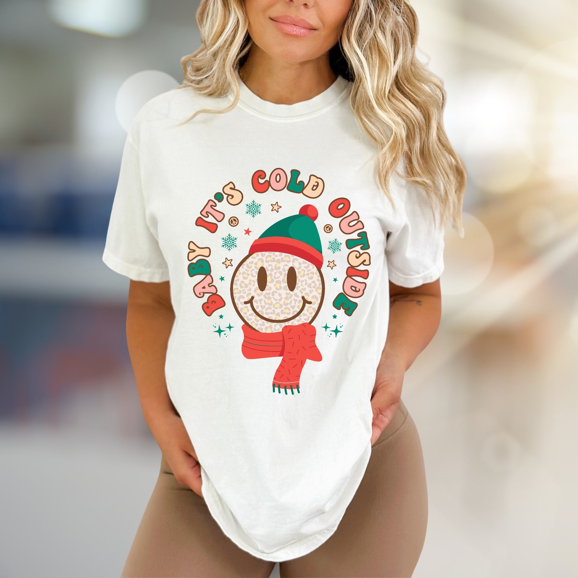 "Baby It's Cold Outside" Winter Smiley Graphic Tee, a Festive Comfort Pick for Holiday Lovers