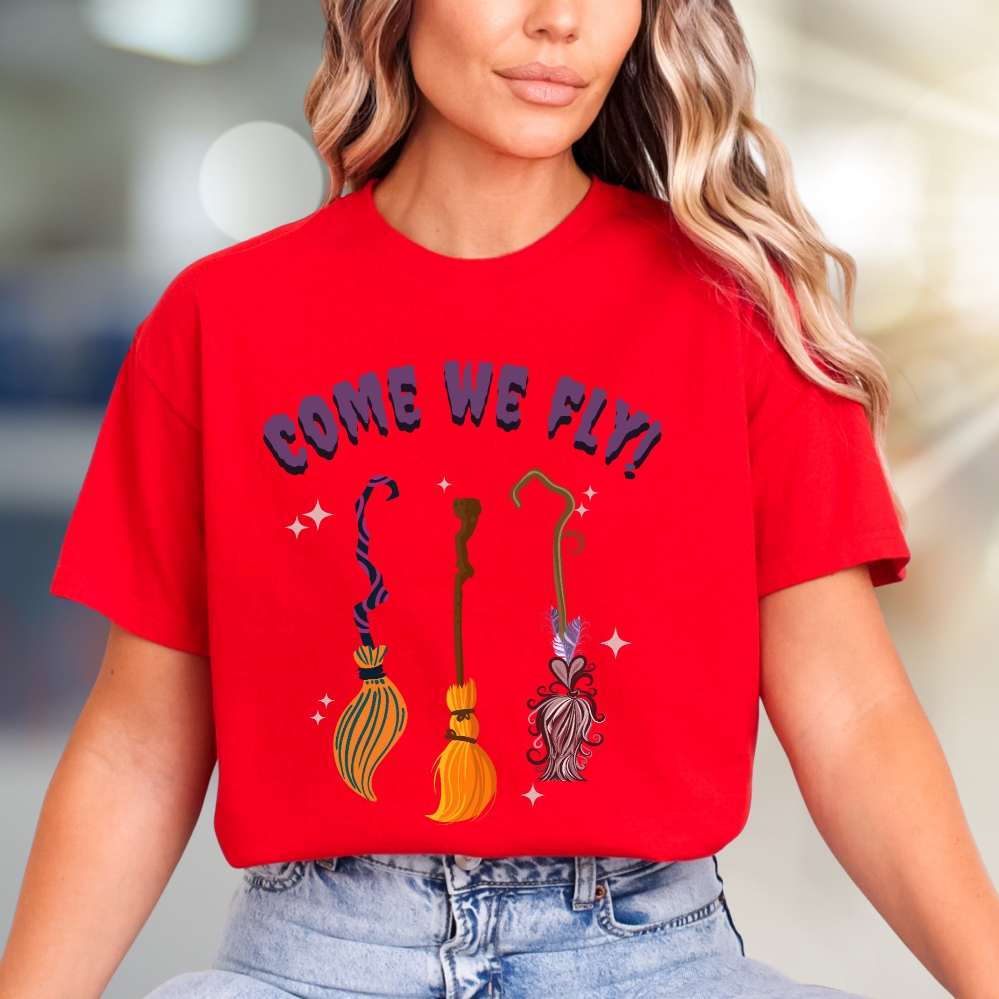 "COME WE FLY!" Witchy Broomstick Graphic Tee, a Spooky Chic Pick for Halloween Enthusiasts